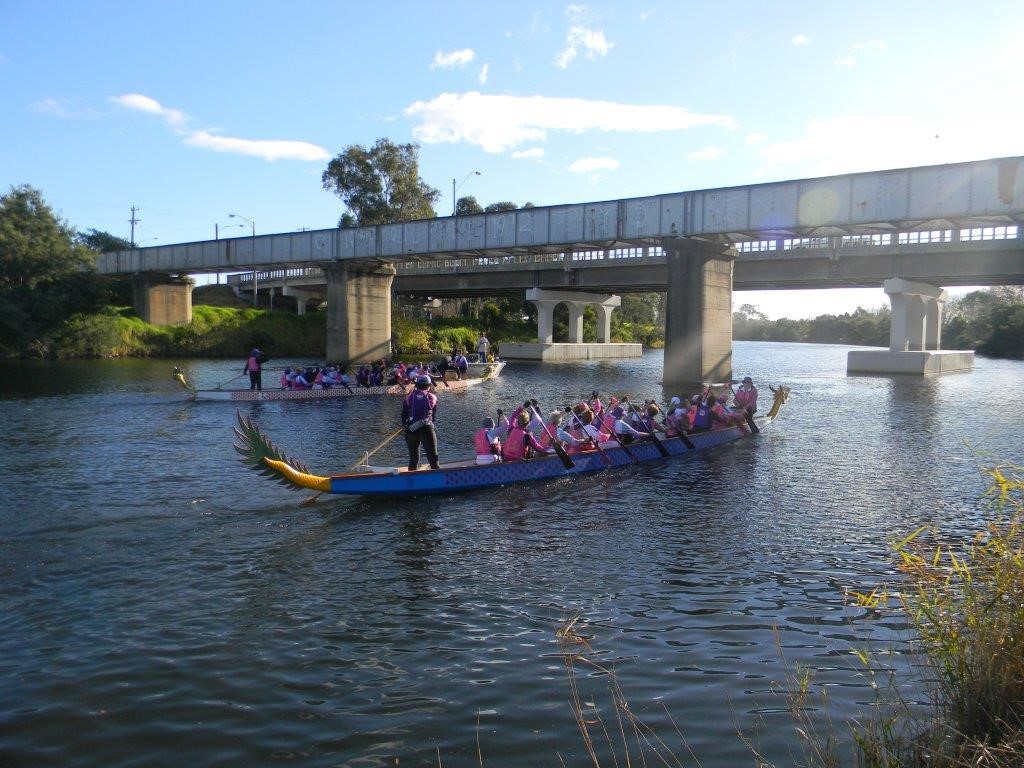 Image of a teams competing in a dragon boat race
