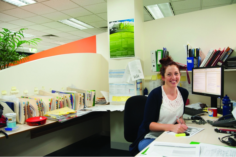 Happy female office worker