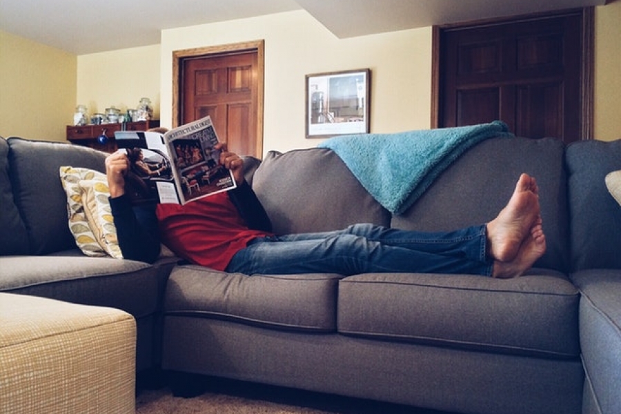 Man Relaxing On Couch