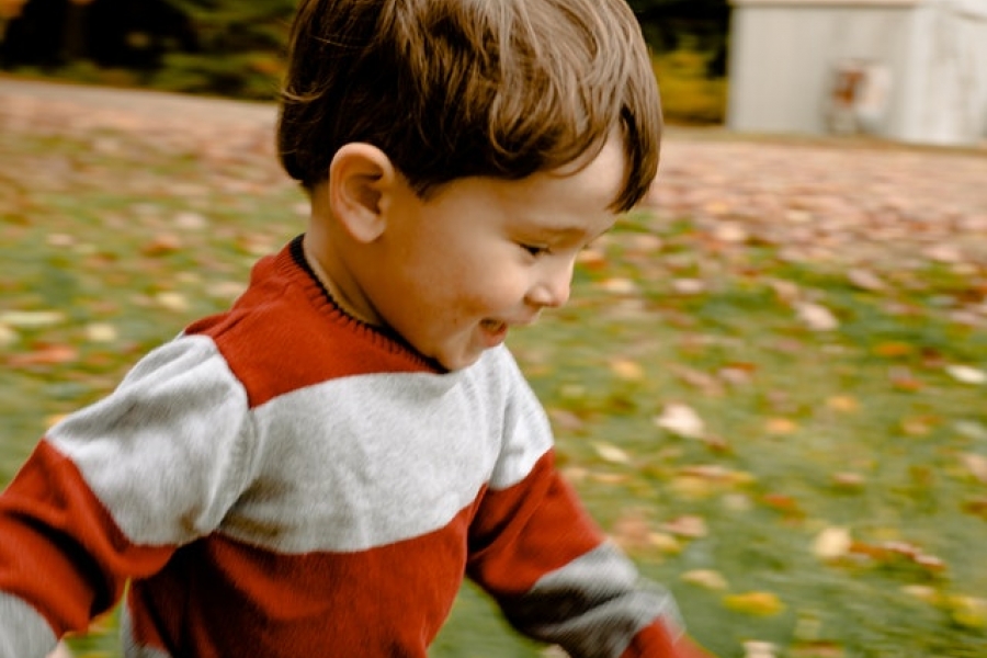 photo-of-toddler-running-on-grass Toddler running on grass