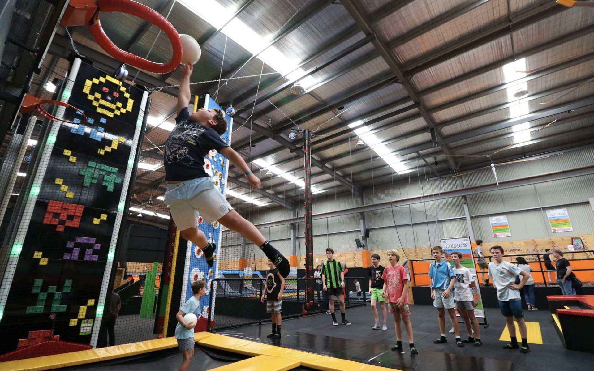 Image courtesy Jump & Climb Image of children jumping on indoor trampolines and playing sports