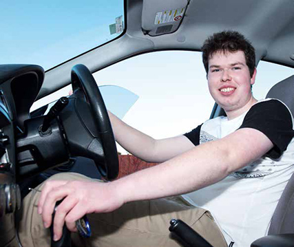Young man driving a car Young man driving a car