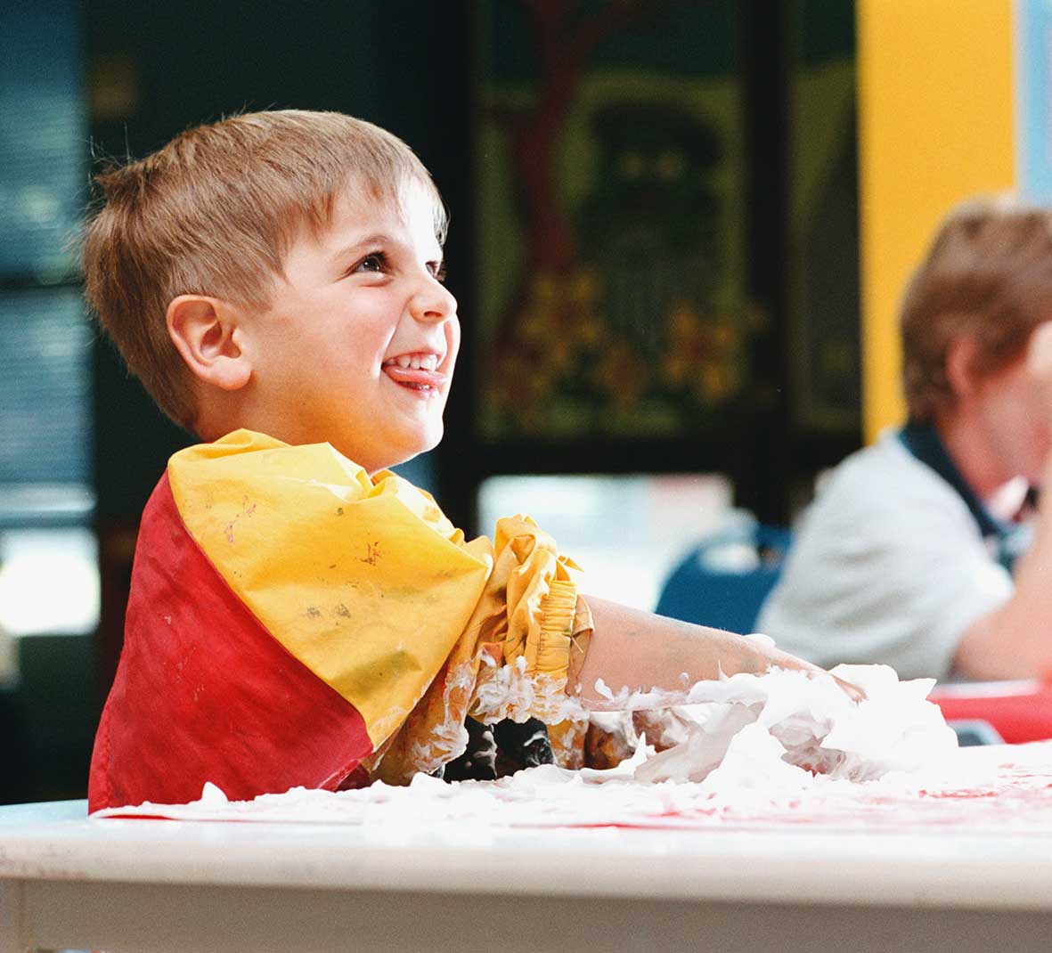 creche boy has fun with foam creche boy has fun with foam