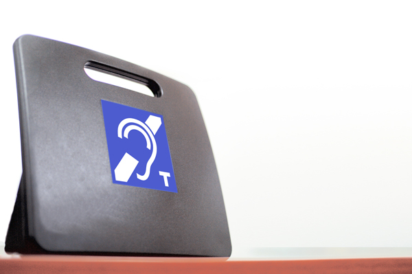 Portable desktop hearing loop.