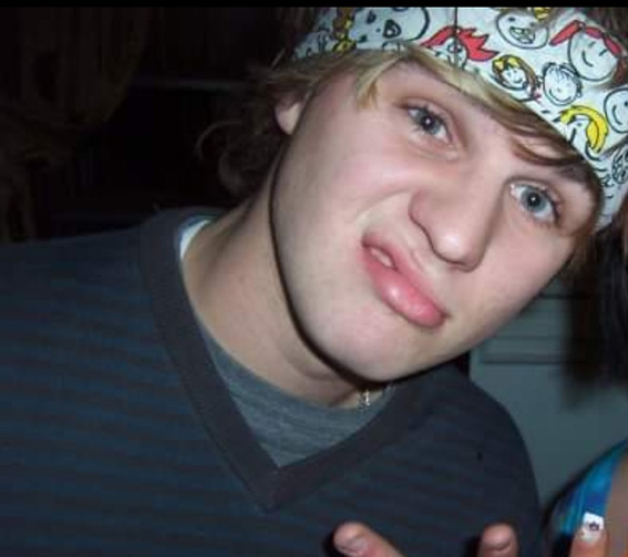 Pictured is Jamie as a teenager wearing a bandana and making a silly face at the camera. This image was taken around the time Jamie started gambling