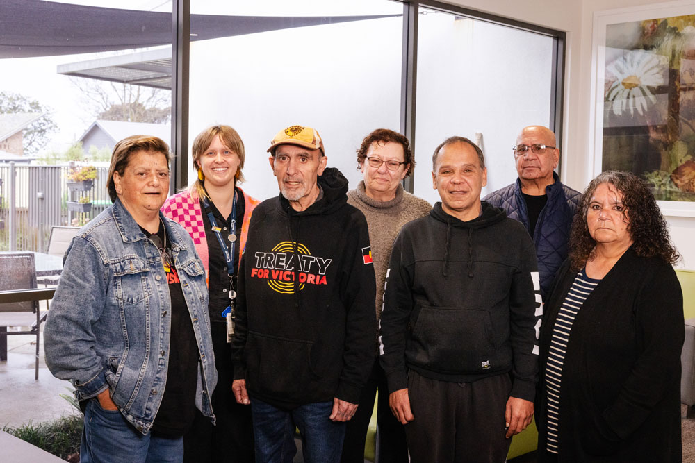 The LCHS First Nations Advisory Group. A group of First Nations community members and LCHS staff members stand together, smiling at the camera.