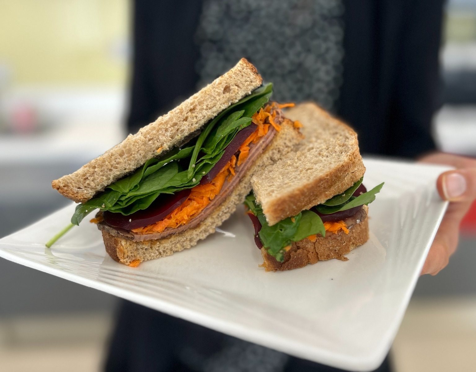 A salad and beef sandwich